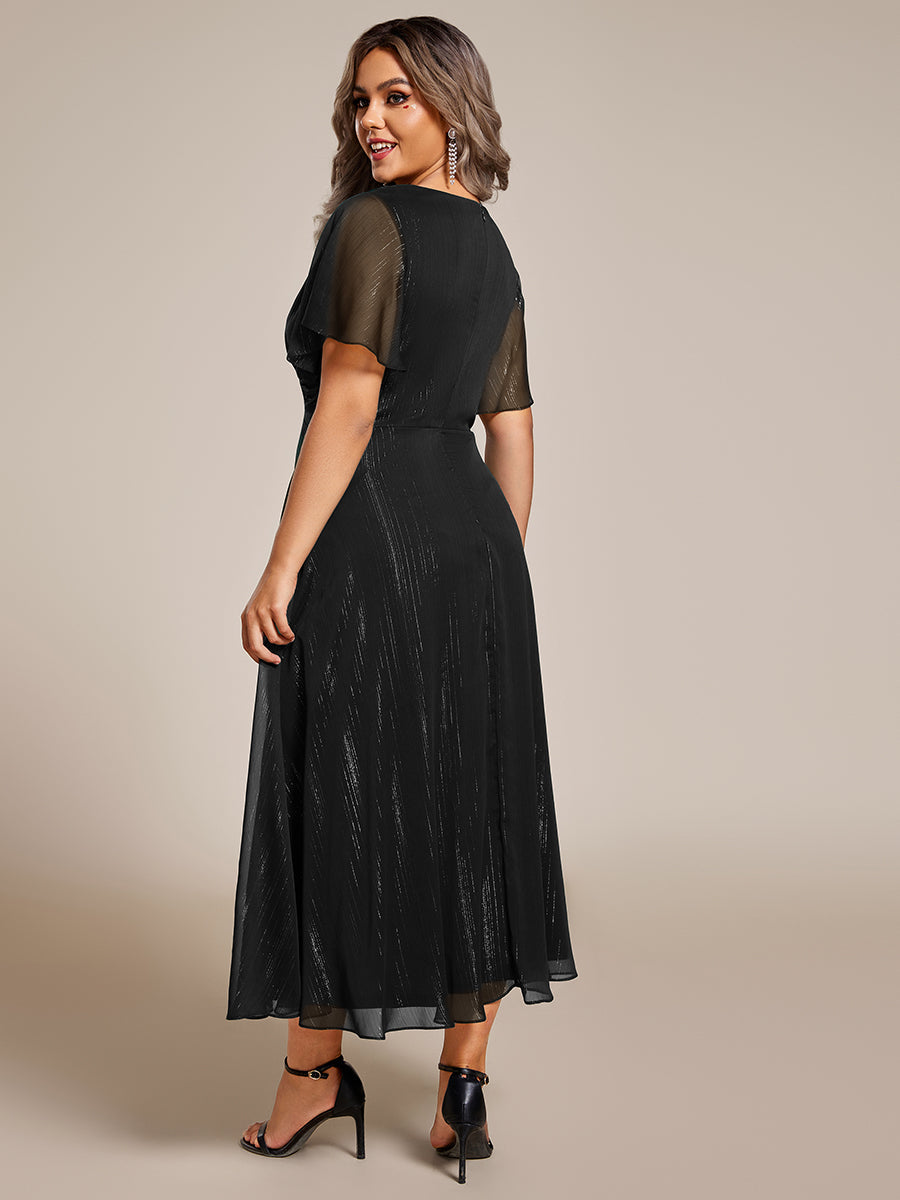 Color=Black | Plus Shimmer V Neck Tea Length Wedding Guest Dress With Short Sleeves-Black